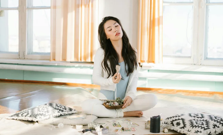 Woman seated in serene meditative mindfulness pose